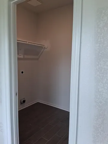 a view of an empty walk in closet