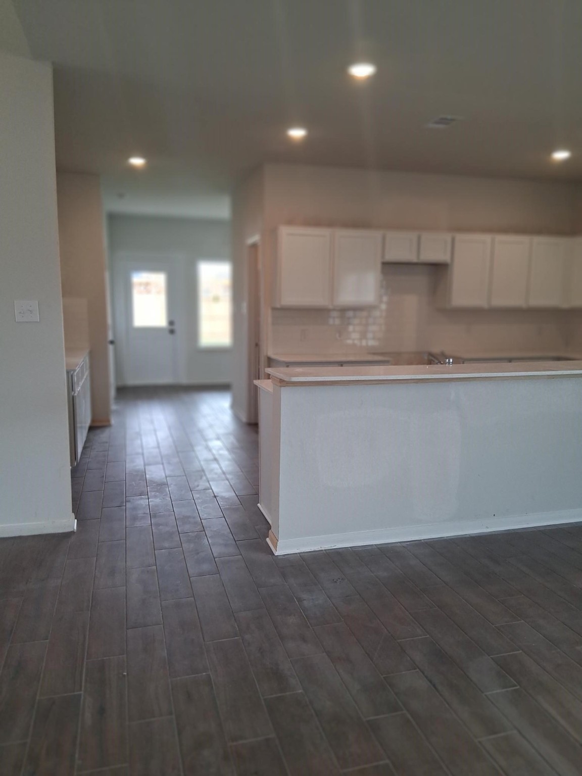 1926 Middle Pass Lane Angleton, TX 77515 - Photo 5 of 22 a kitchen with stainless steel appliances granite countertop a dishwasher a stove a sink with wooden floors and cabinets