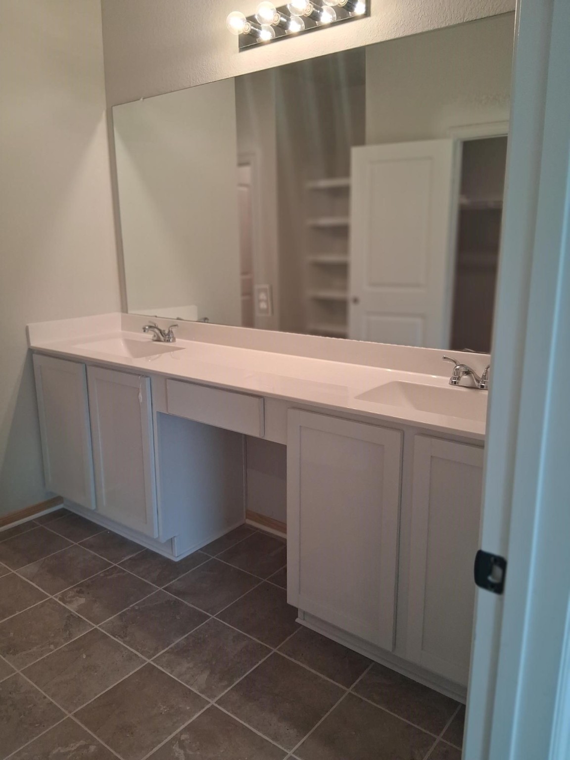 1926 Middle Pass Lane Angleton, TX 77515 - Photo 7 of 22 a bathroom with a sink and a mirror