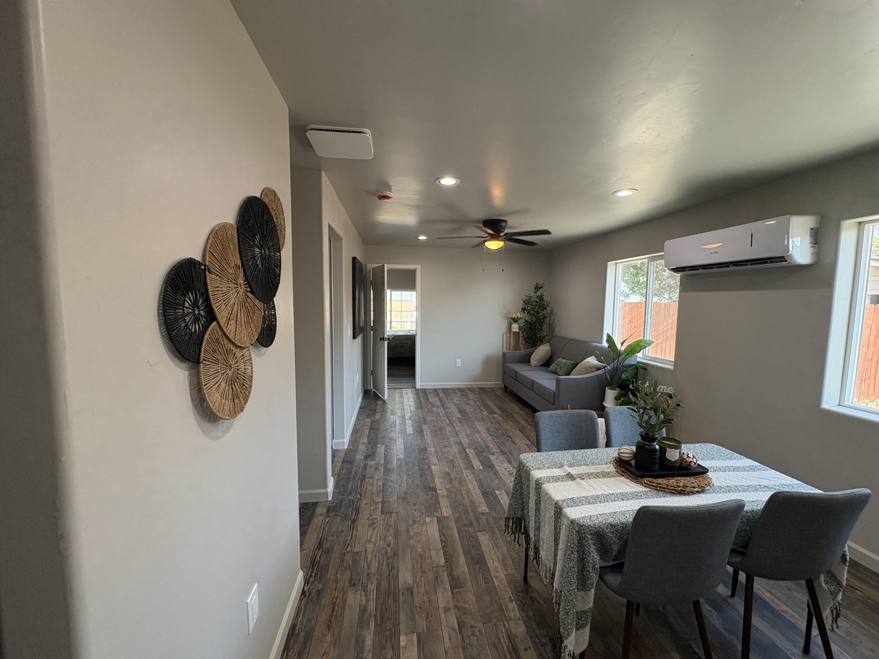 177 South Callison Road Tipton, CA 93272 - Photo 5 of 18 a living room with furniture and a chandelier