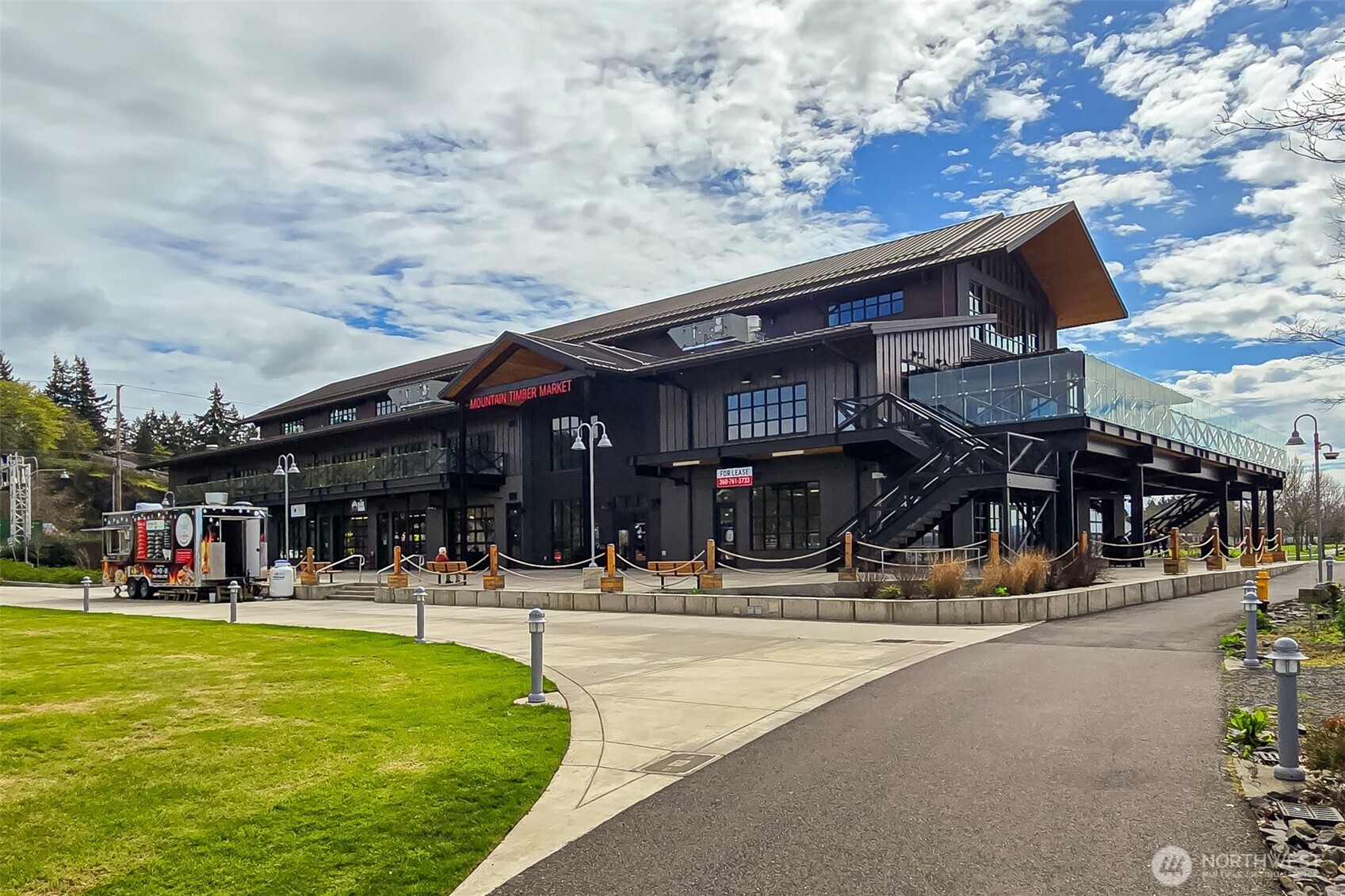 0 Spencer Creek Road, Unit LOT 1 Kalama, WA 98625 - Photo 23 of 31 a swimming pool with outdoor seating yard and deck