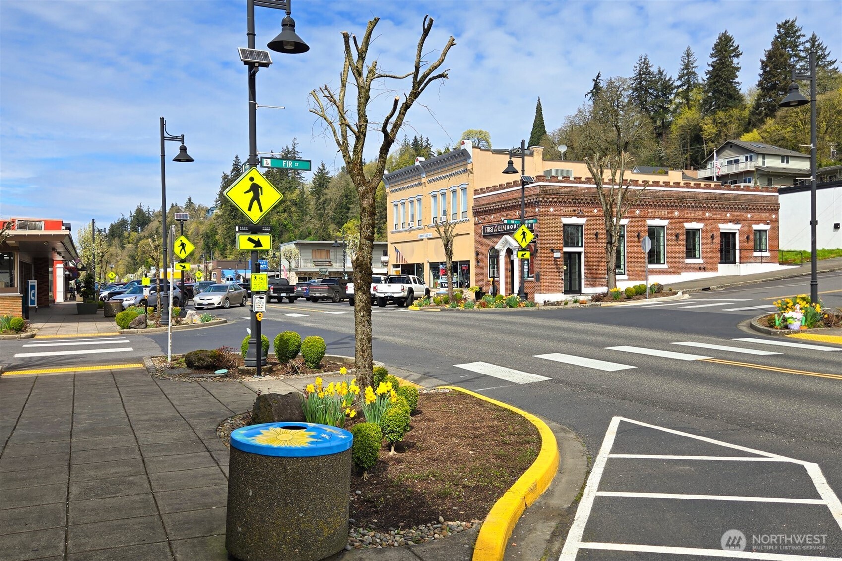 0 Spencer Creek Road, Unit LOT 1 Kalama, WA 98625 - Photo 27 of 31 a front view of a building with yellow lighting