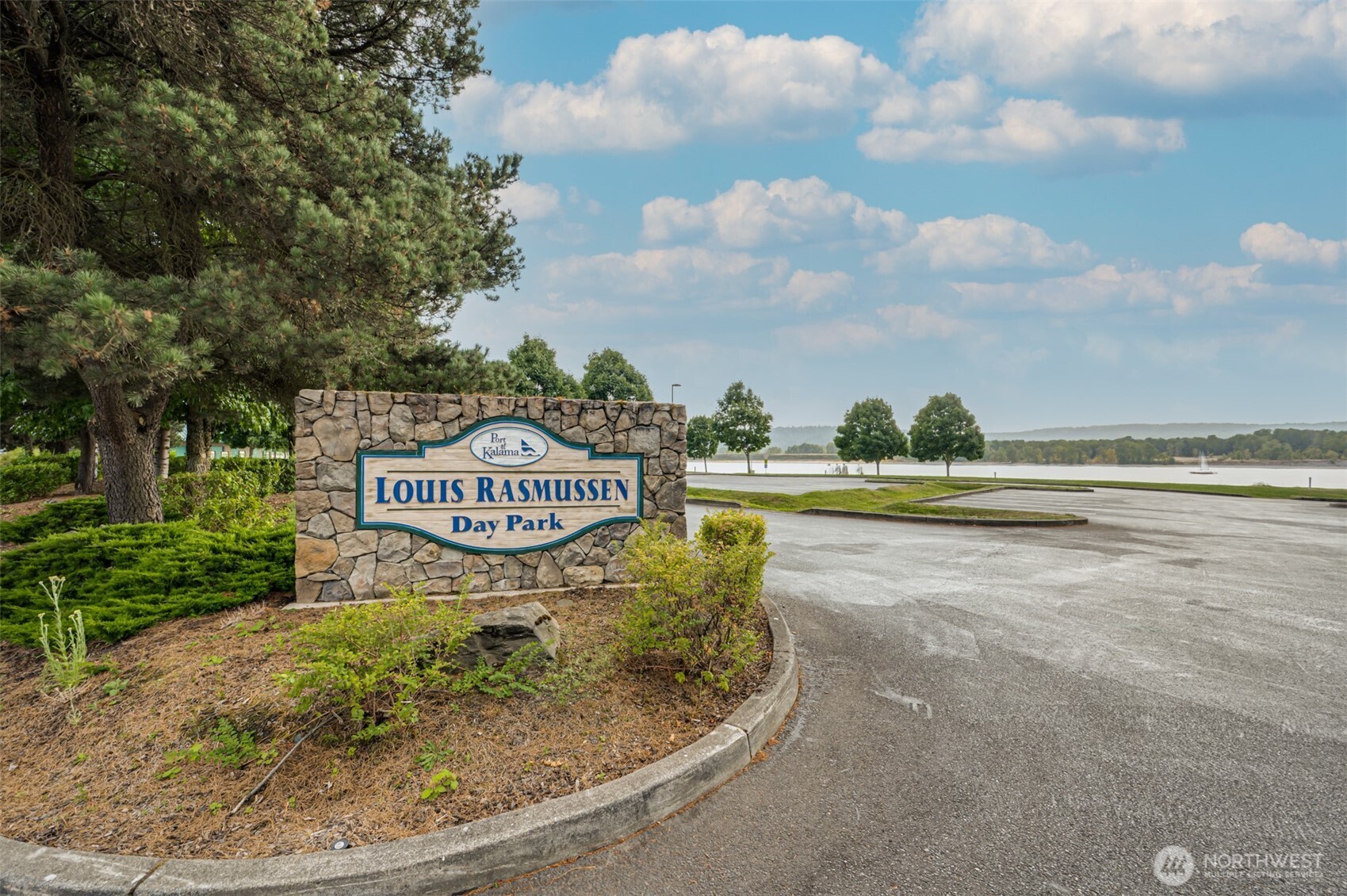 0 Spencer Creek Road, Unit LOT 1 Kalama, WA 98625 - Photo 30 of 31 a sign board with ocean view