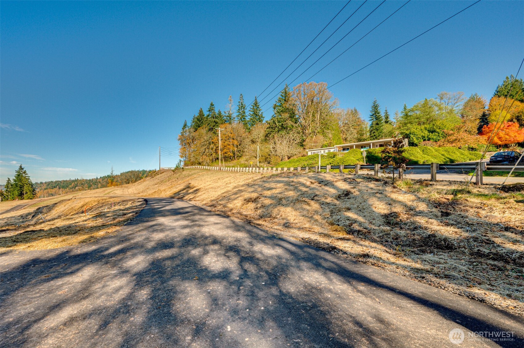 0 Spencer Creek Road, Unit LOT 1 Kalama, WA 98625 - Photo 8 of 31 a view of a yard with wooden fence