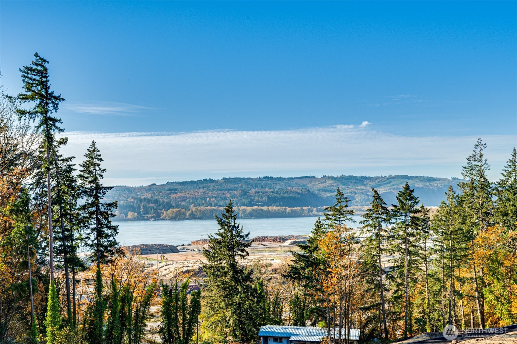 0 Spencer Creek Road, Unit LOT 1 Kalama, WA 98625 - Photo 10 of 31 a view of a lake with a city