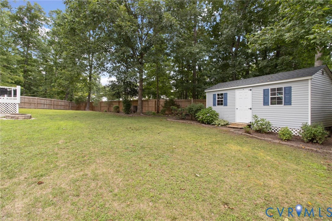 7807 Clover Ridge Place Chesterfield, VA 23832 - Photo 41 of 51 Expansive backyard featuring a manicured lawn, a p