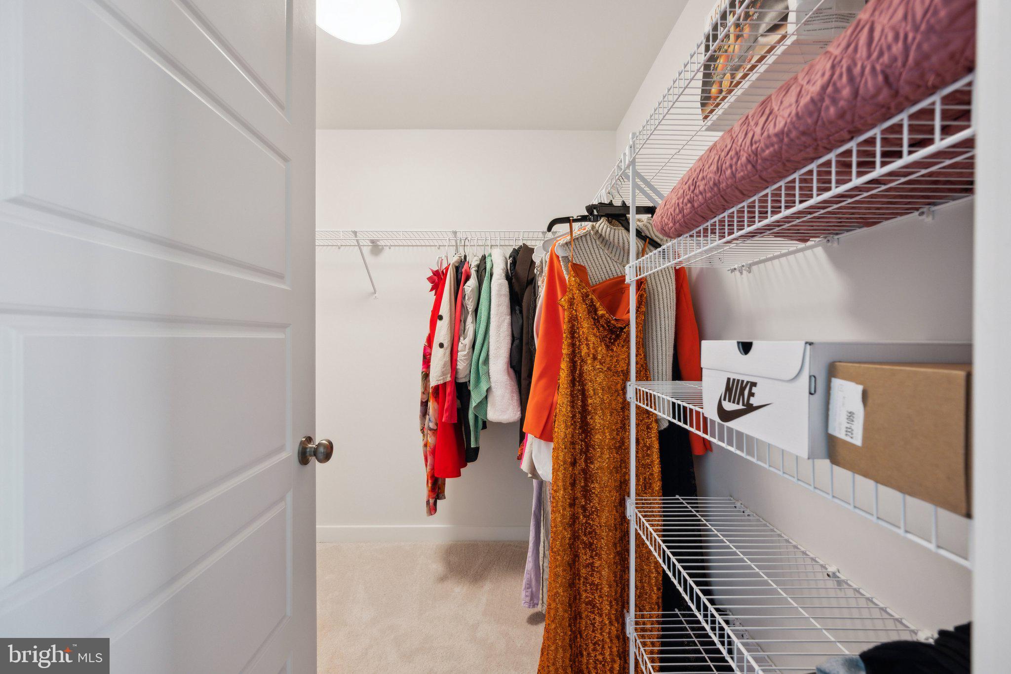 319 Summit Point Boulevard Bowie, MD 20716 - Photo 13 of 28 a view of a closet with storage