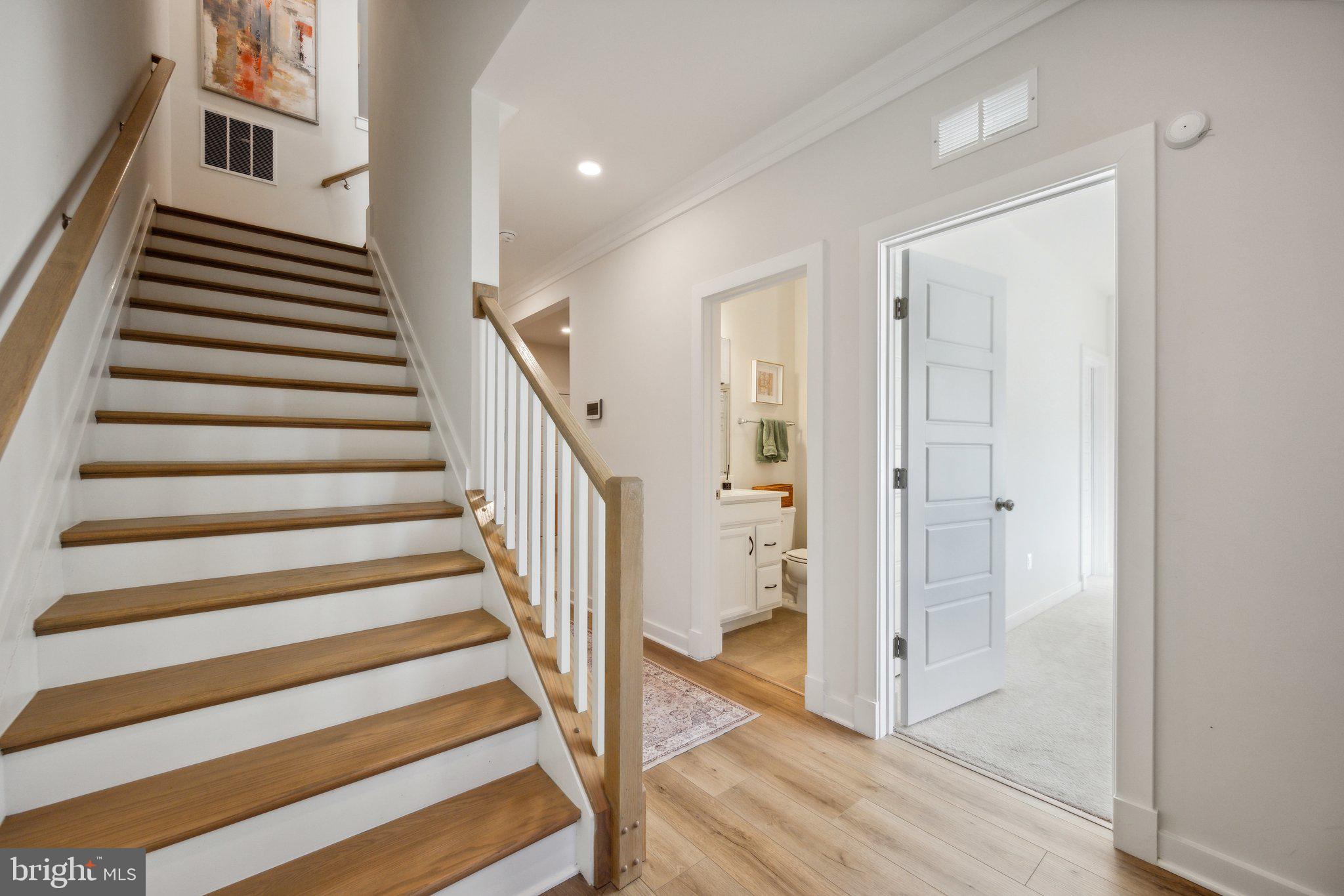 319 Summit Point Boulevard Bowie, MD 20716 - Photo 26 of 28 a view of entryway with wooden floor and windows
