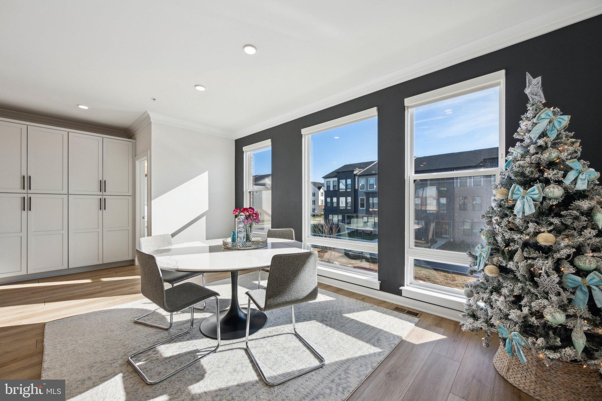 319 Summit Point Boulevard Bowie, MD 20716 - Photo 4 of 28 a workspace with furniture window and wooden floor