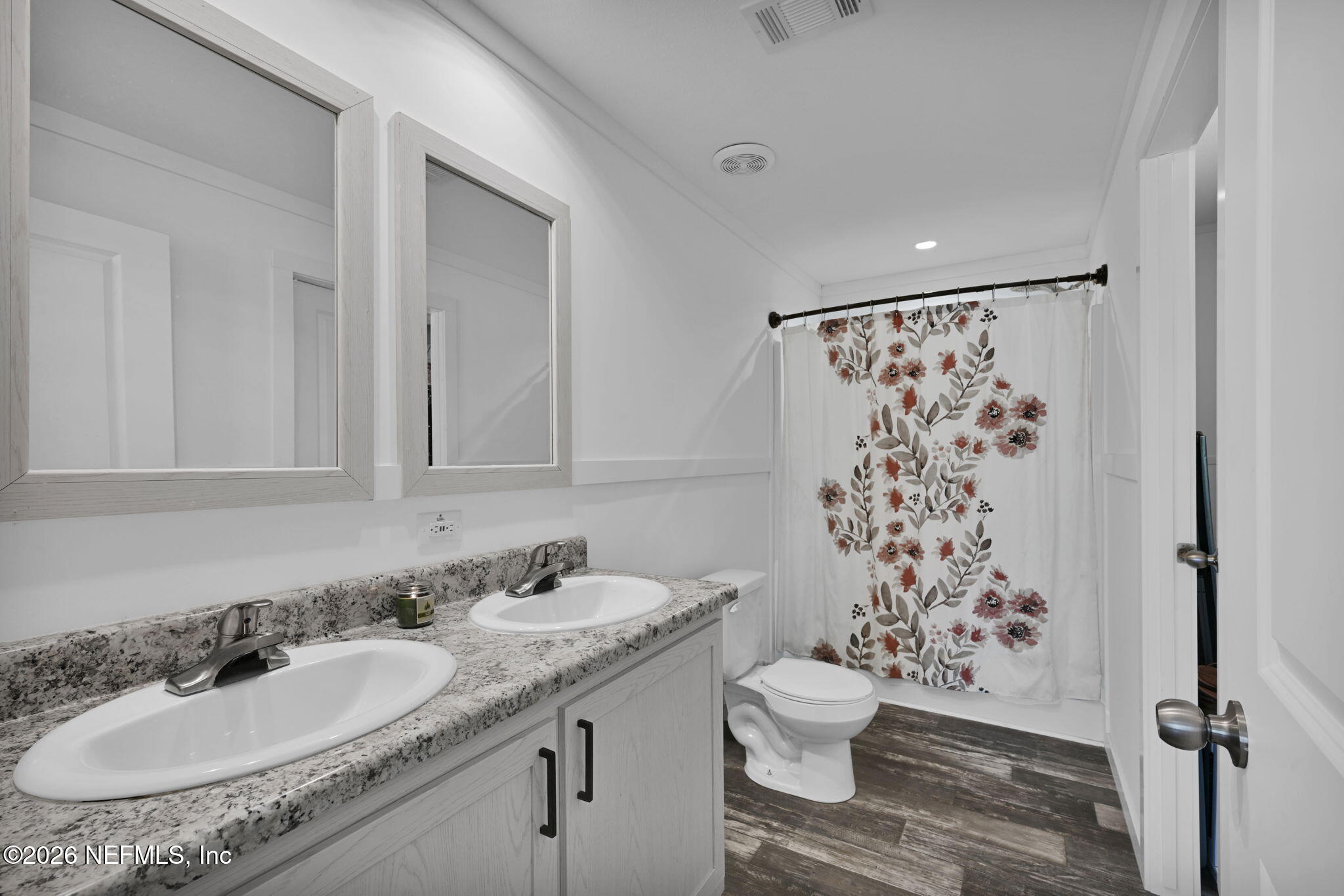 540783 Lem Turner Road Callahan, FL 32011 - Photo 31 of 36 a bathroom with a granite countertop sink toilet and shower