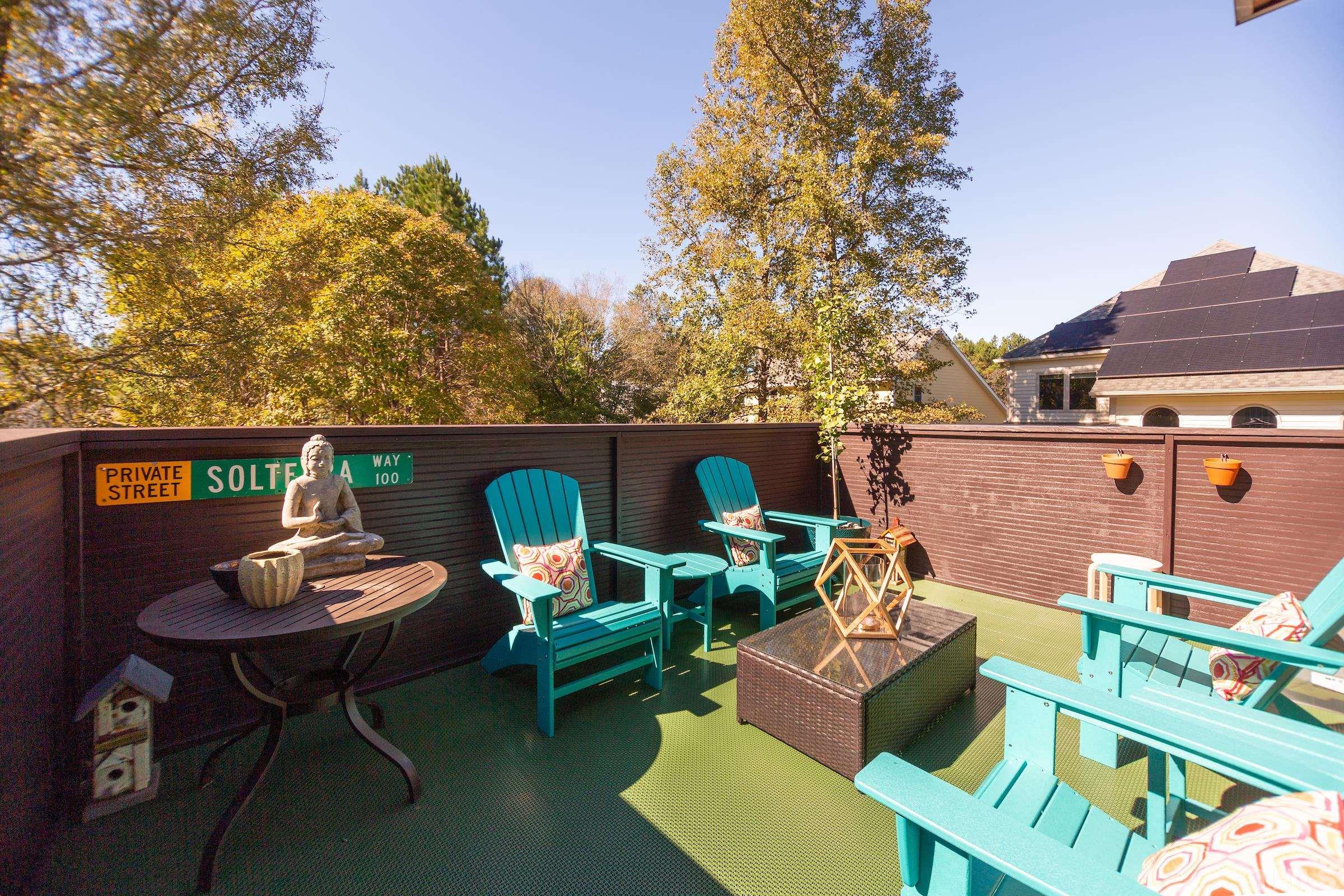 116 Solterra Way Durham, NC 27705 - Photo 23 of 30 a backyard of a house with table and chairs