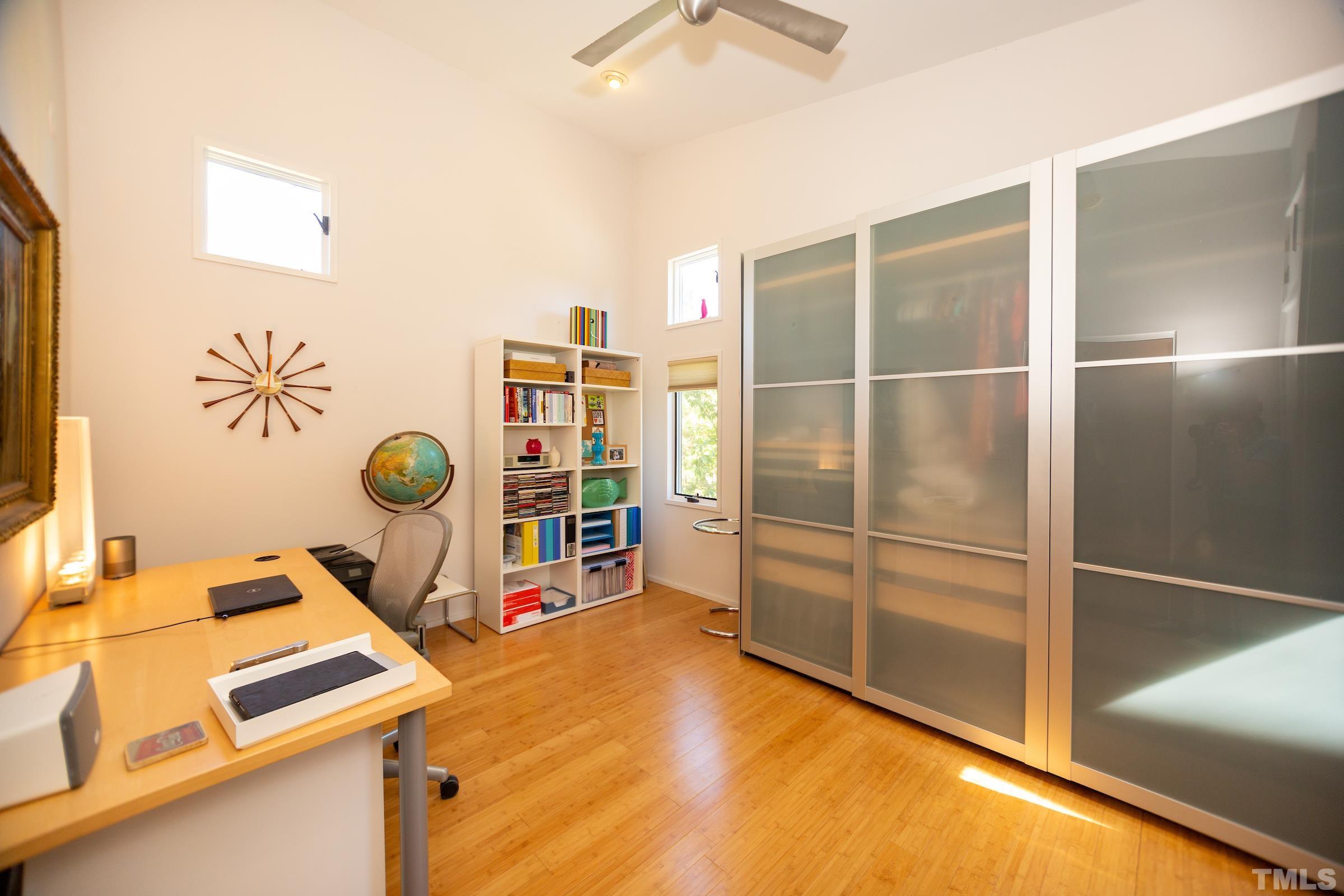 116 Solterra Way Durham, NC 27705 - Photo 24 of 30 a room with furniture and a table