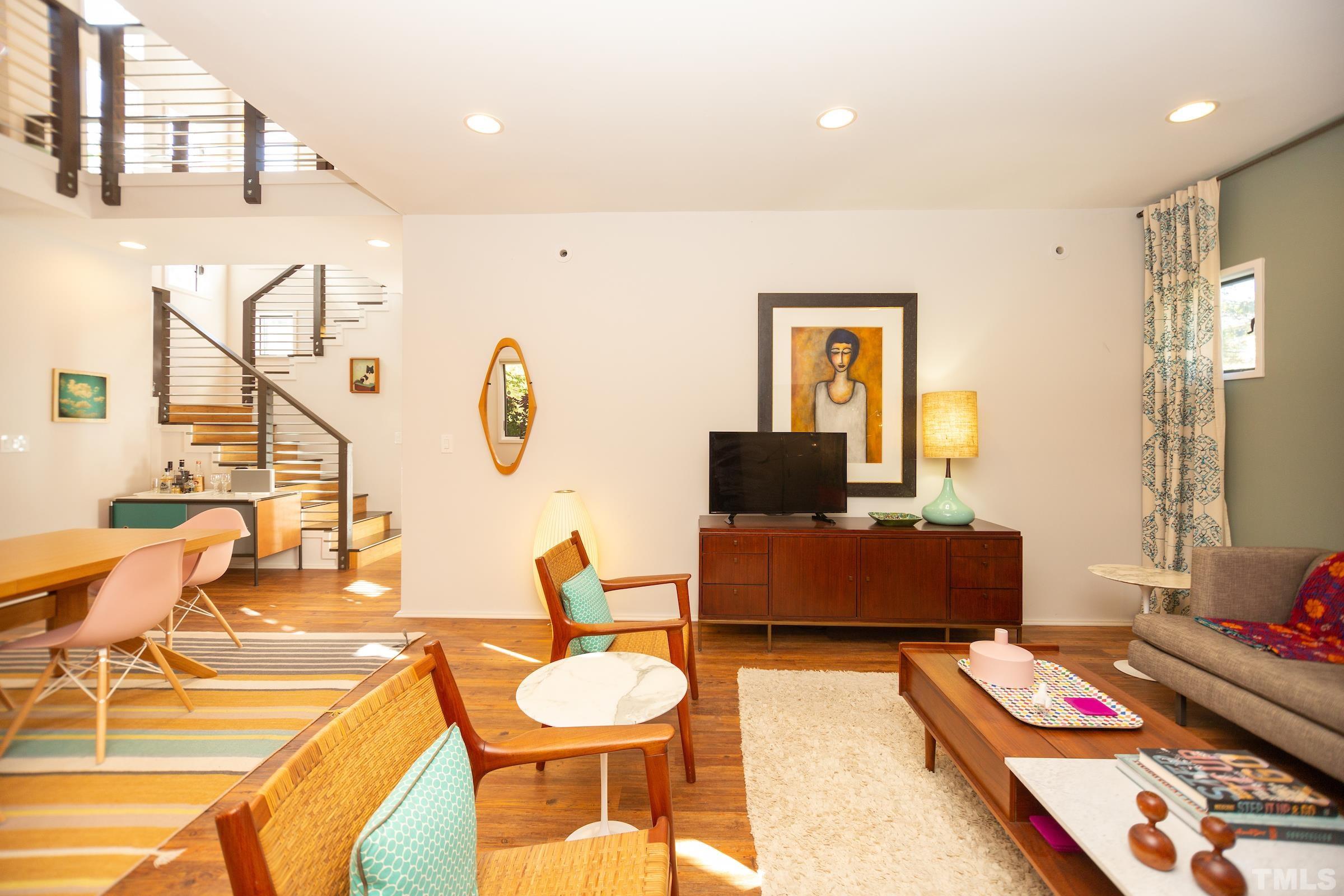 116 Solterra Way Durham, NC 27705 - Photo 4 of 30 a living room with furniture and wooden floor