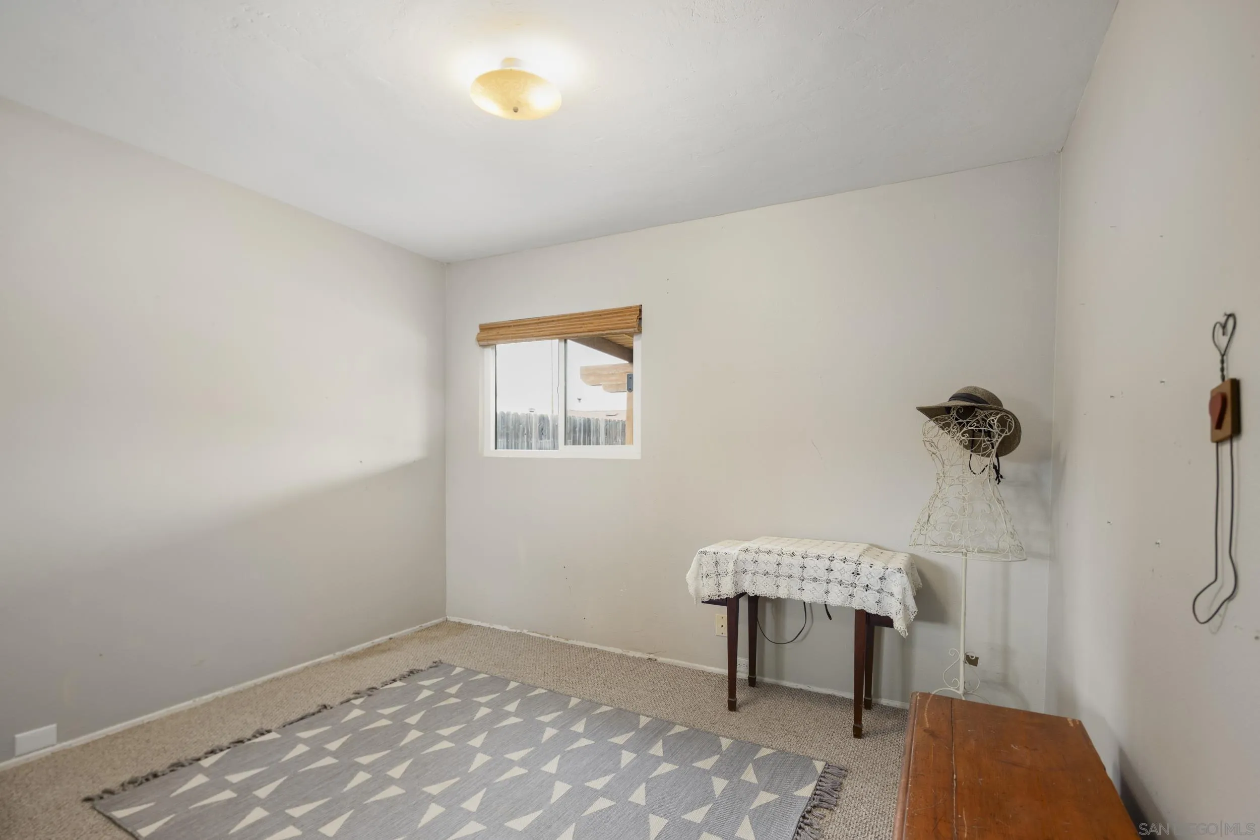 622 Ellen Lane El Cajon, CA 92019 - Photo 15 of 17 a bathroom with a sink and a mirror