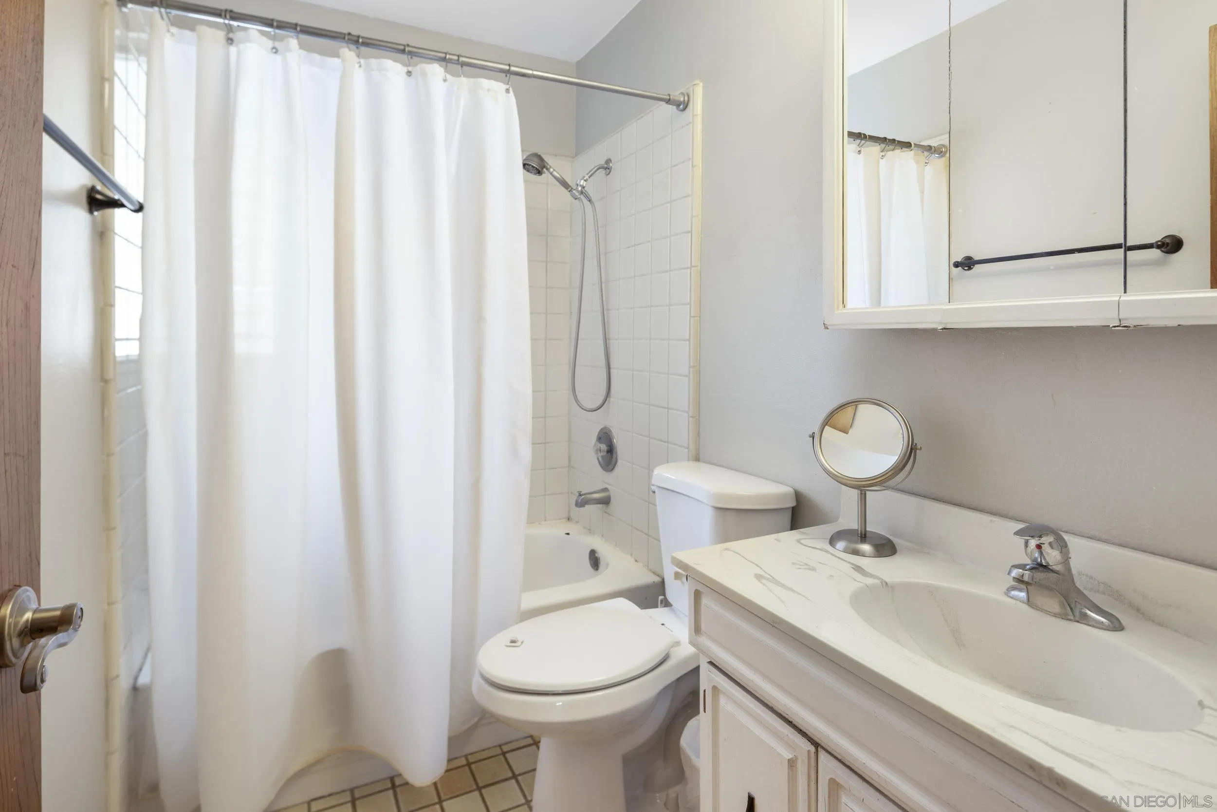 622 Ellen Lane El Cajon, CA 92019 - Photo 17 of 17 a bathroom with a sink toilet and shower