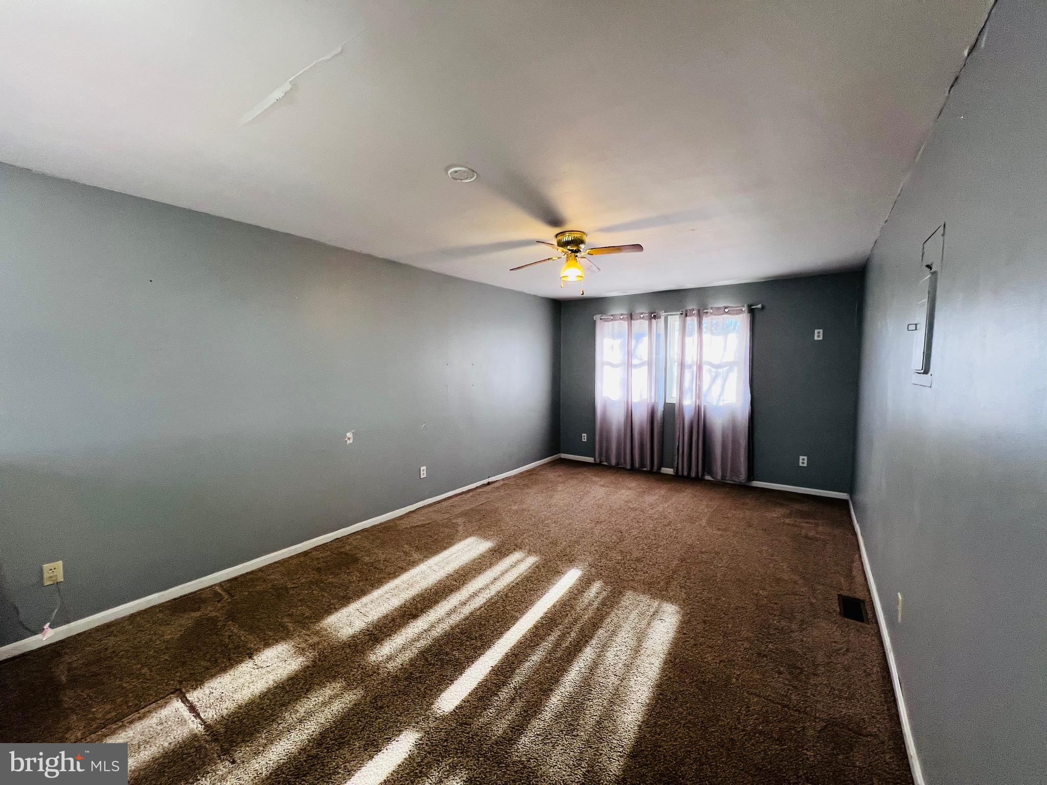 320 Cedar Avenue Colonial Beach, VA 22443 - Photo 26 of 47 a view of an empty room and window