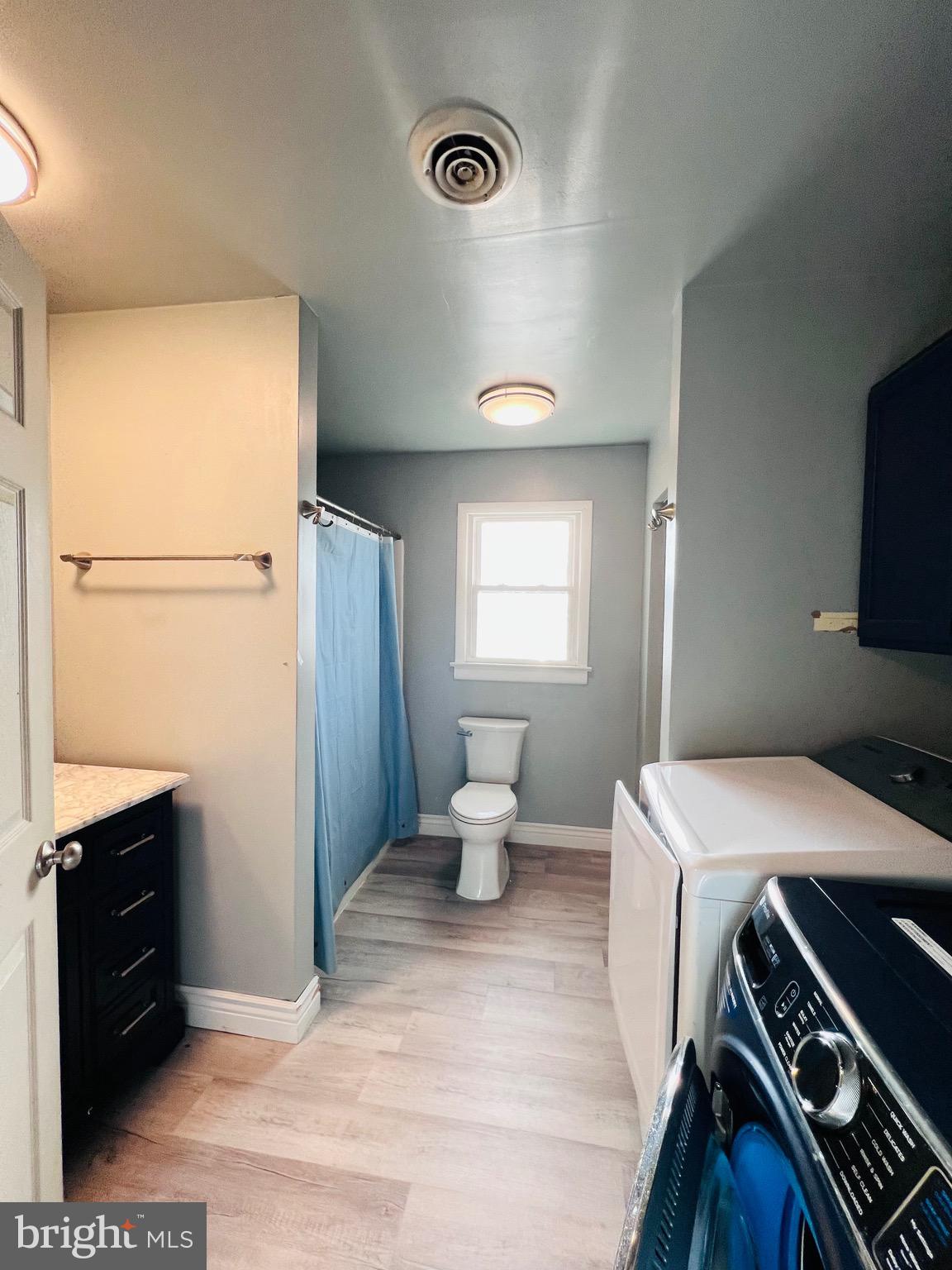 320 Cedar Avenue Colonial Beach, VA 22443 - Photo 28 of 47 a kitchen with a refrigerator and a stove top oven