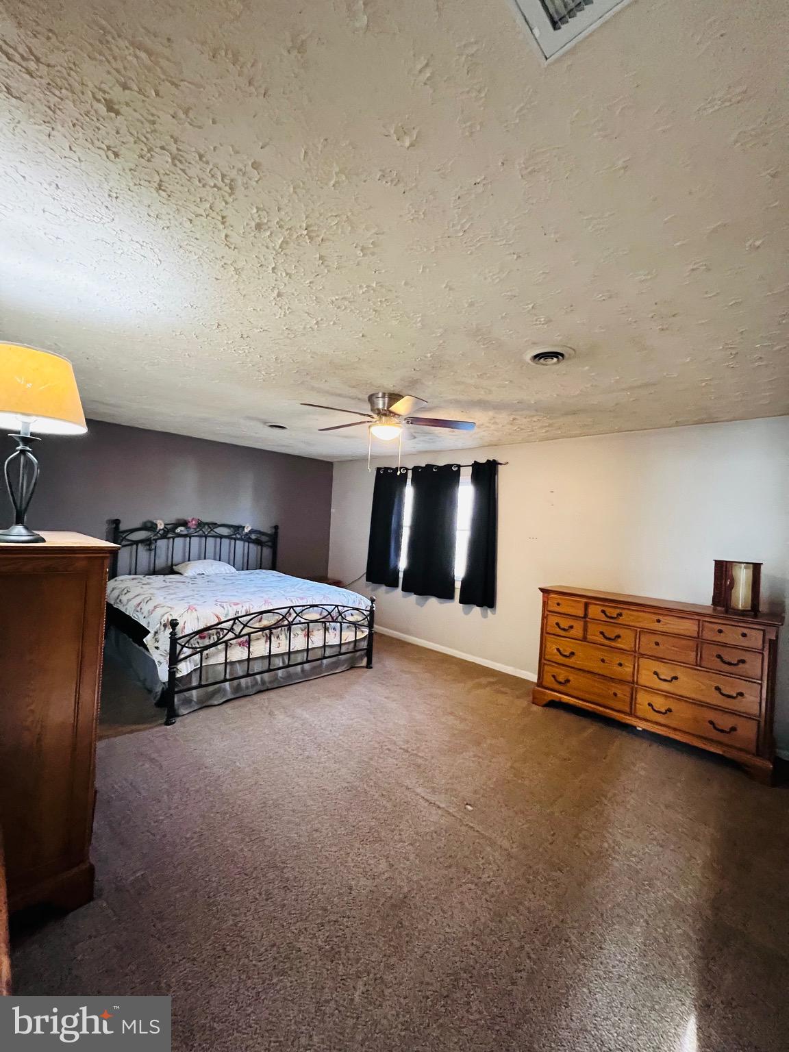 320 Cedar Avenue Colonial Beach, VA 22443 - Photo 30 of 47 a view of a room with furniture and a flat screen tv