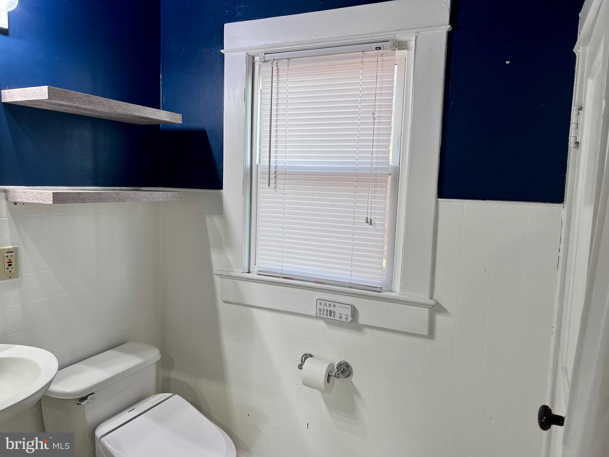 320 Cedar Avenue Colonial Beach, VA 22443 - Photo 38 of 47 a bathroom with a toilet and a sink