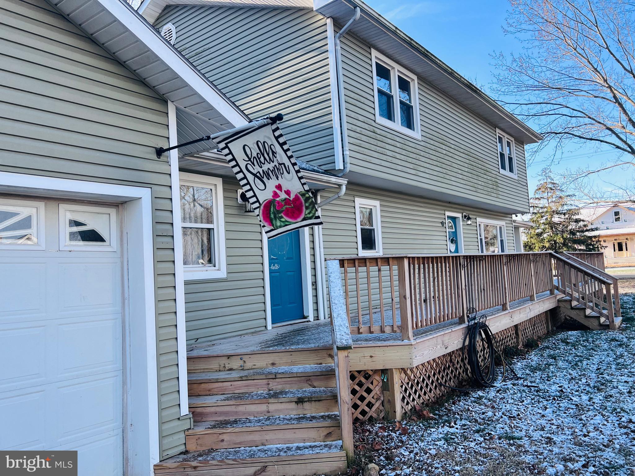 320 Cedar Avenue Colonial Beach, VA 22443 - Photo 6 of 47 a front view of a house with wooden fence