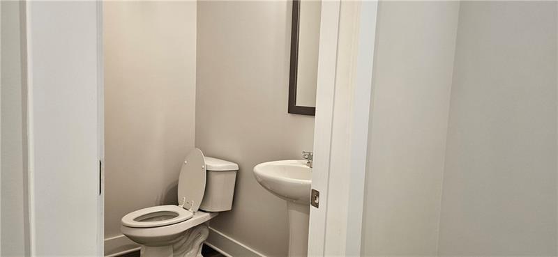 1727 Prospect Way Conyers, GA 30094 - Photo 12 of 38 a bathroom with a sink and toilet