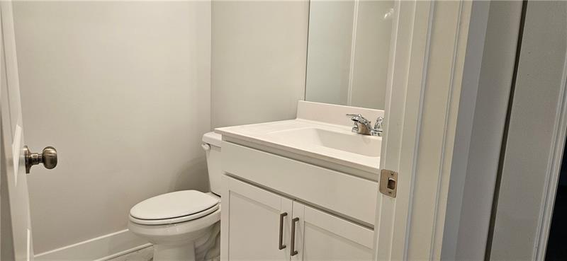 1727 Prospect Way Conyers, GA 30094 - Photo 24 of 38 a bathroom with a sink a toilet and shower