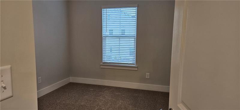 1727 Prospect Way Conyers, GA 30094 - Photo 26 of 38 a view of an empty room with a window