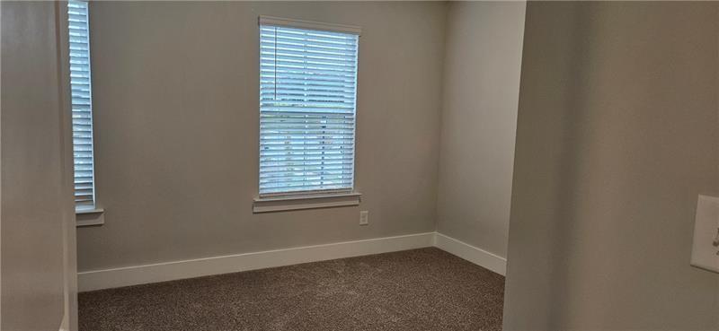 1727 Prospect Way Conyers, GA 30094 - Photo 27 of 38 a view of an empty room with a window