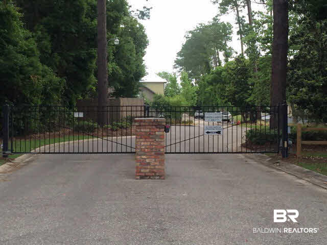 25773 Canal Road, Unit 26 Orange Beach, AL 36561 - Photo 32 of 42 Gated Entrance from Canal Road
