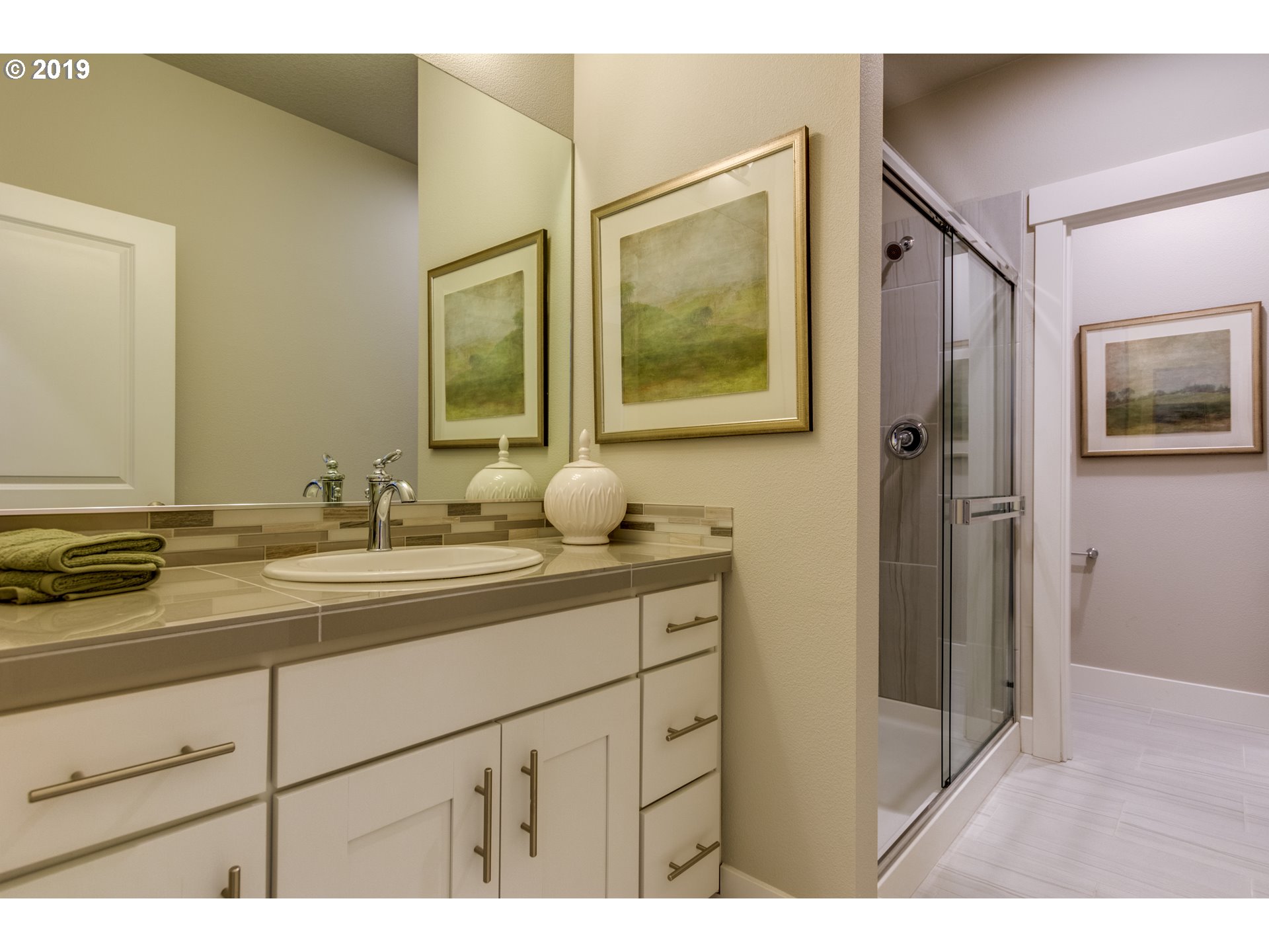 15975 Southwest Wren Lane Beaverton, OR 97007 - Photo 14 of 23 a bathroom with a granite countertop sink mirror and double
