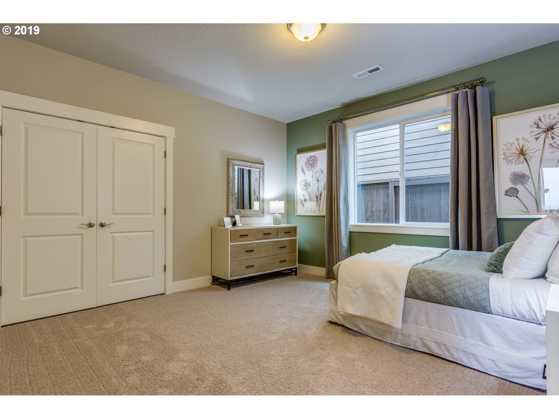 15975 Southwest Wren Lane Beaverton, OR 97007 - Photo 15 of 23 a living room with a bed furniture and a window