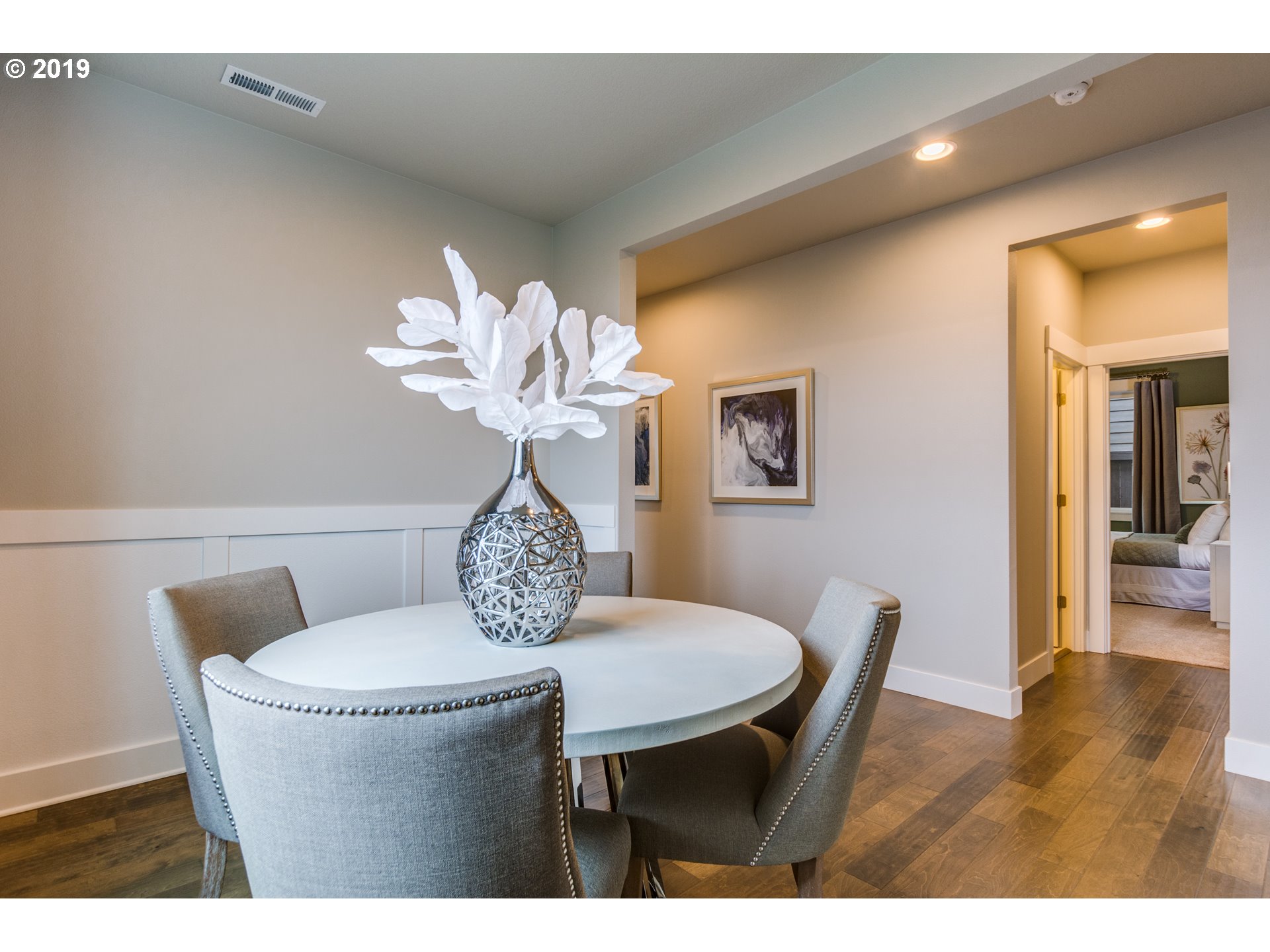 15975 Southwest Wren Lane Beaverton, OR 97007 - Photo 5 of 23 a dining room with furniture and wooden floor