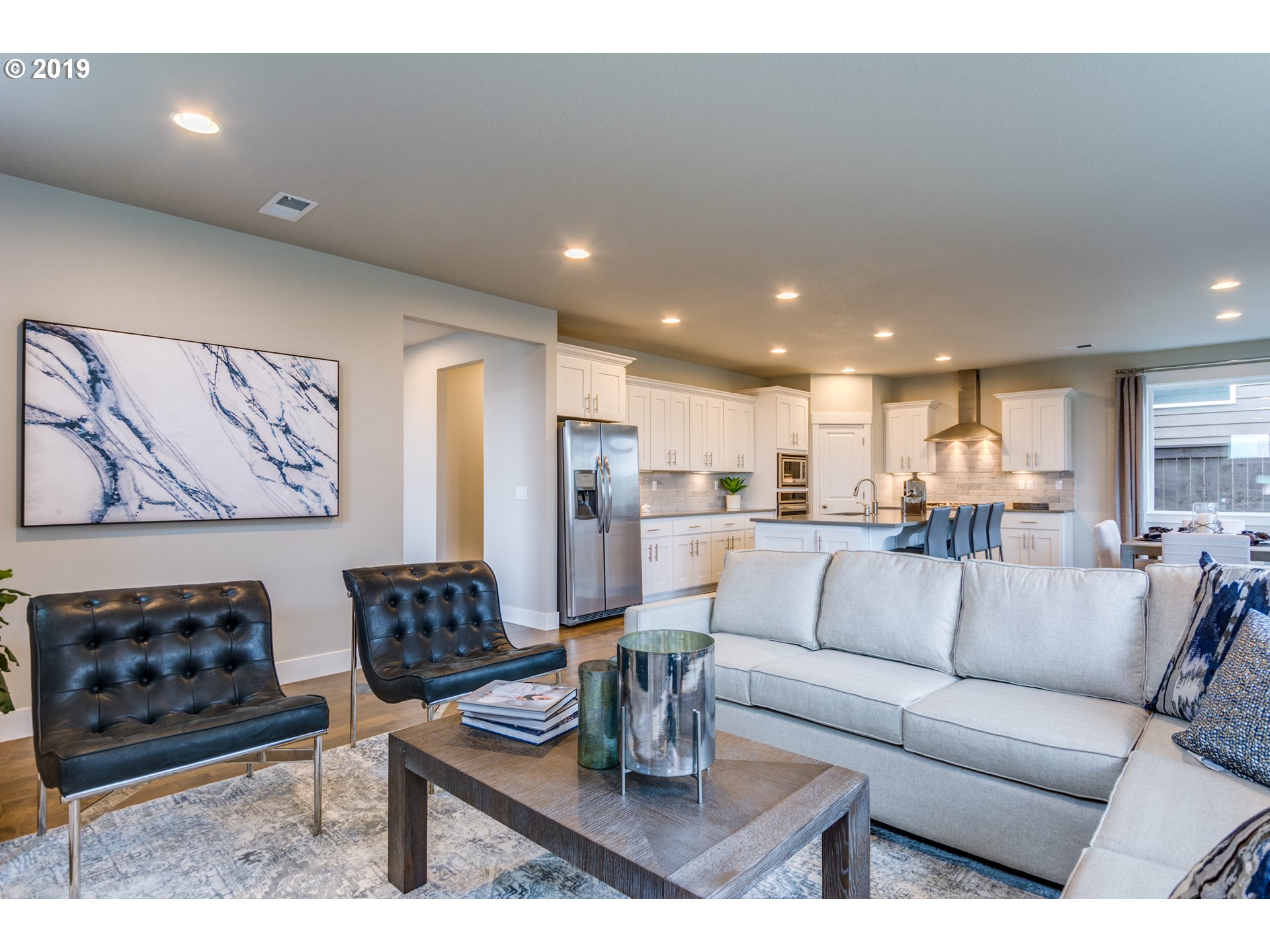 15975 Southwest Wren Lane Beaverton, OR 97007 - Photo 7 of 23 a living room with furniture kitchen view and a table