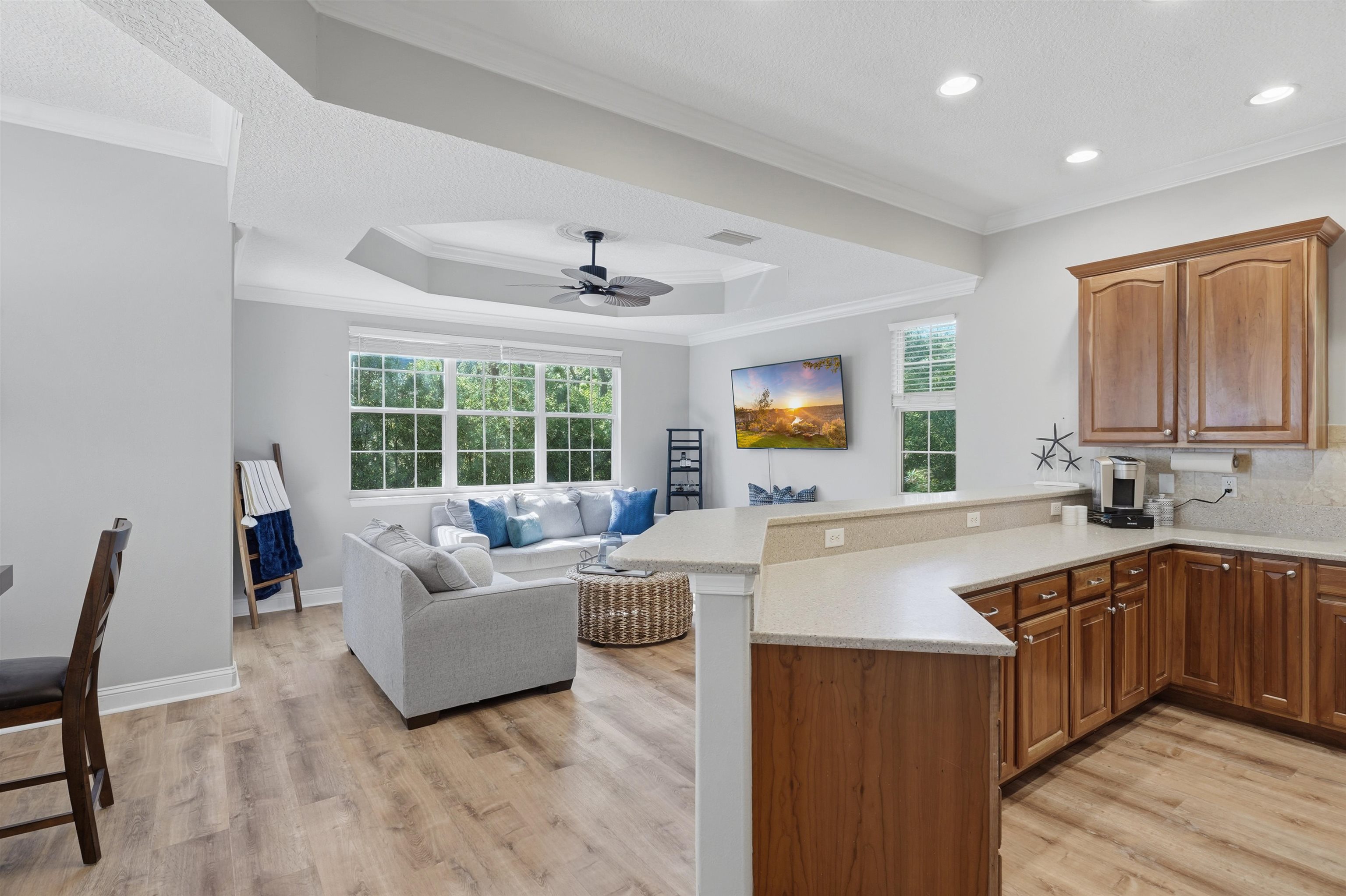2 Lisbon Street St. Augustine, FL 32080 - Photo 39 of 39 a living room with stainless steel appliances granite countertop furniture a sink a flat screen computer and a window