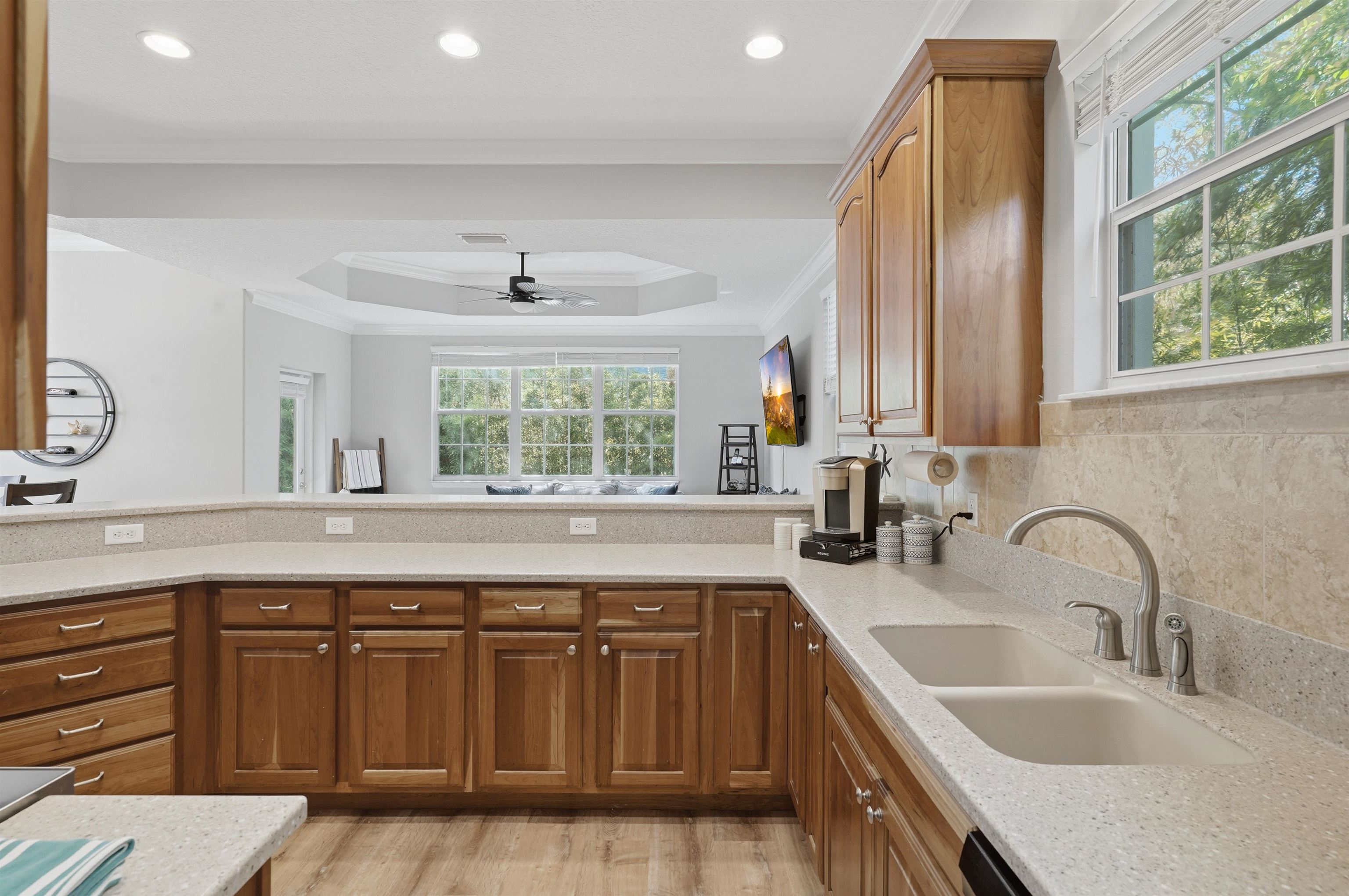 2 Lisbon Street St. Augustine, FL 32080 - Photo 15 of 39 a kitchen with a sink stove and cabinets