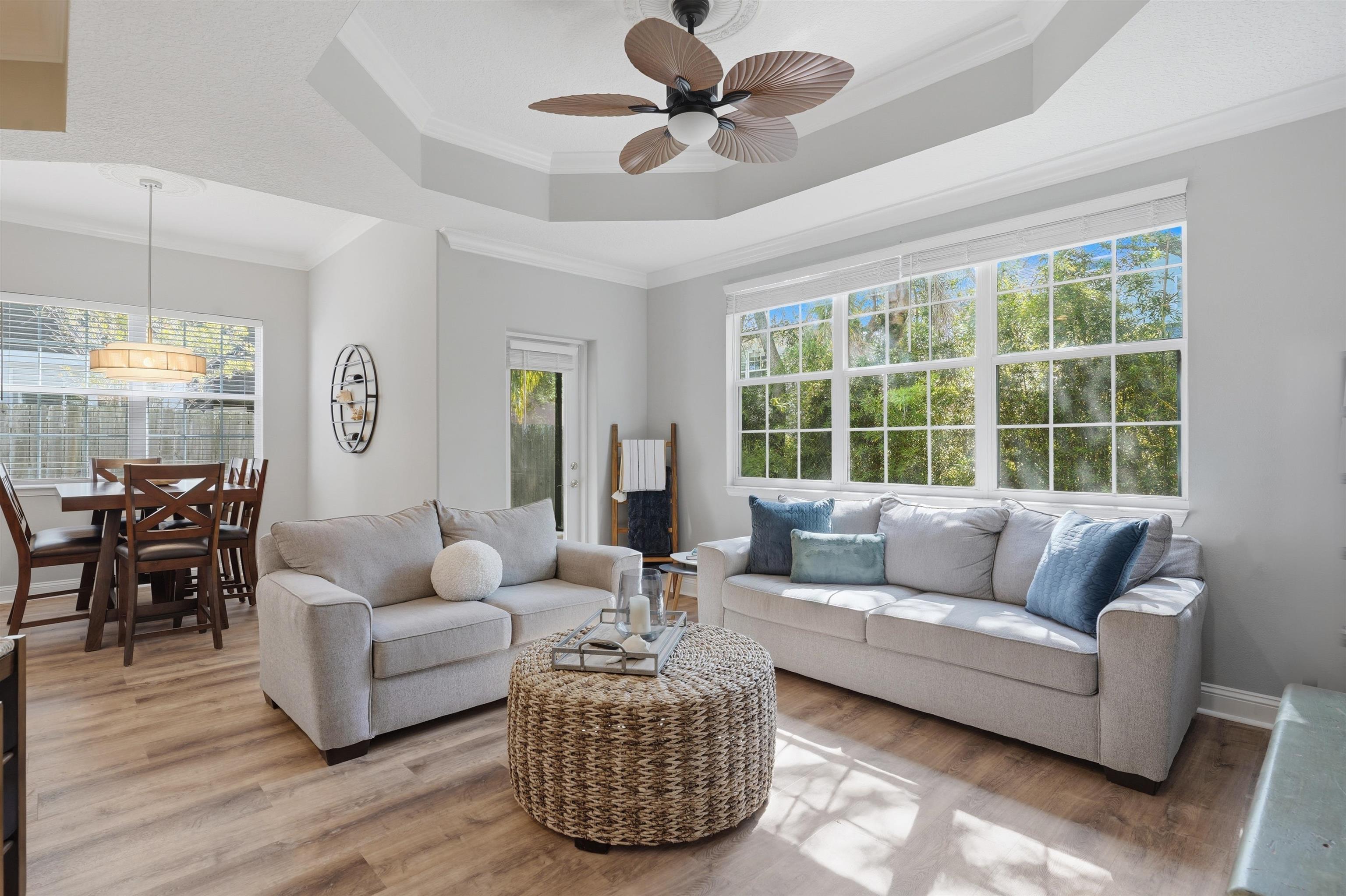 2 Lisbon Street St. Augustine, FL 32080 - Photo 2 of 39 a living room with furniture and a large window