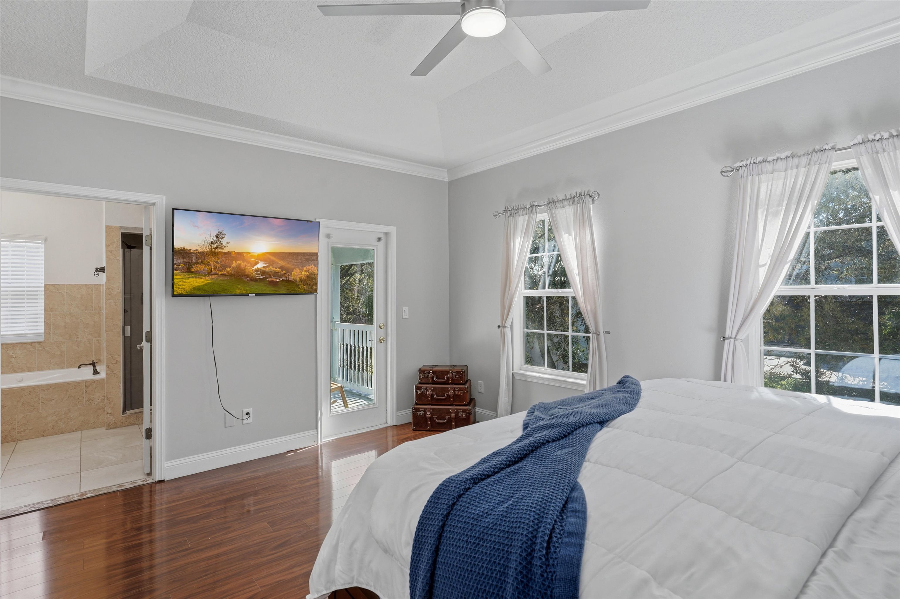 2 Lisbon Street St. Augustine, FL 32080 - Photo 23 of 39 a bedroom with a bed and wooden floor