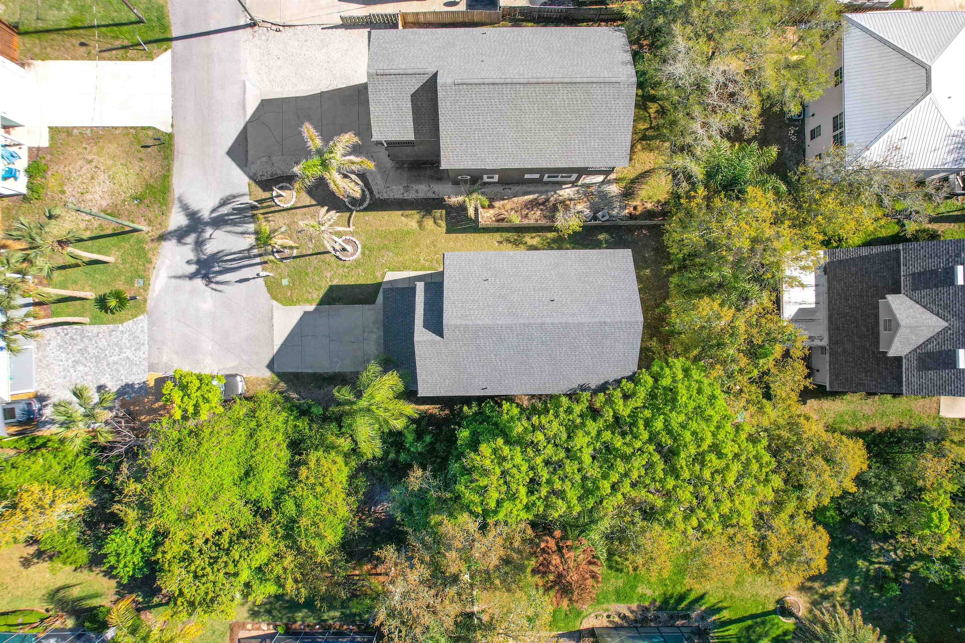 2 Lisbon Street St. Augustine, FL 32080 - Photo 35 of 39 front view of a house with a yard and fountain in the background