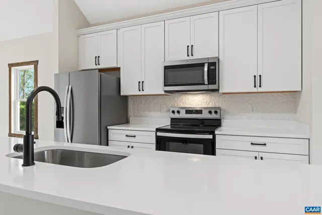 a view of empty room with floor to ceiling window