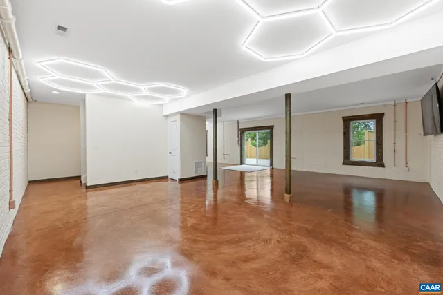 an aerial view of mountain with trees all around