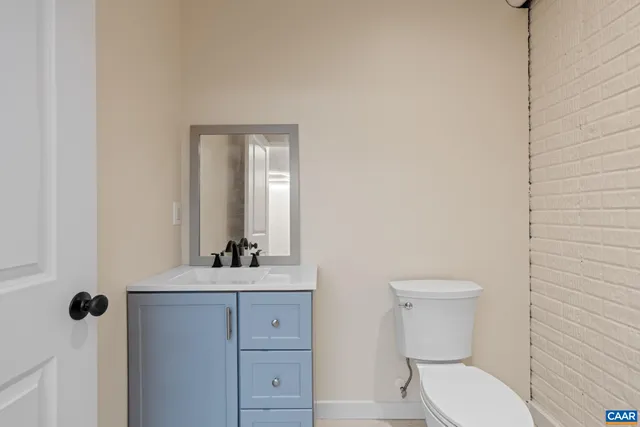 a view of a balcony with wooden floor and fence