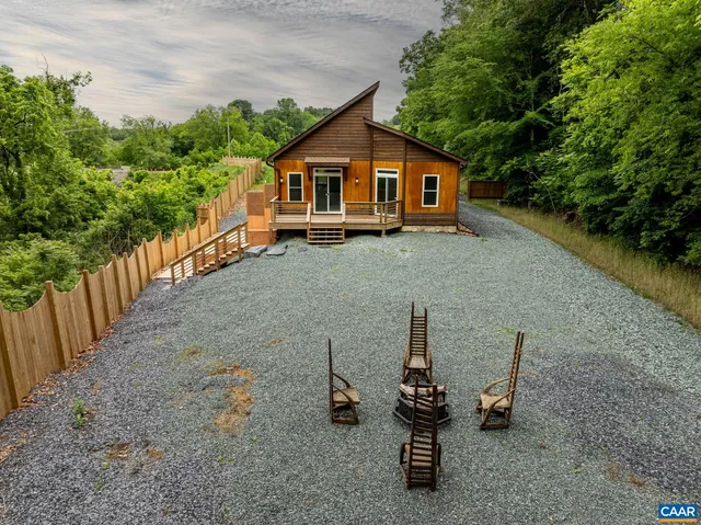 a view of a pathway both side of yard