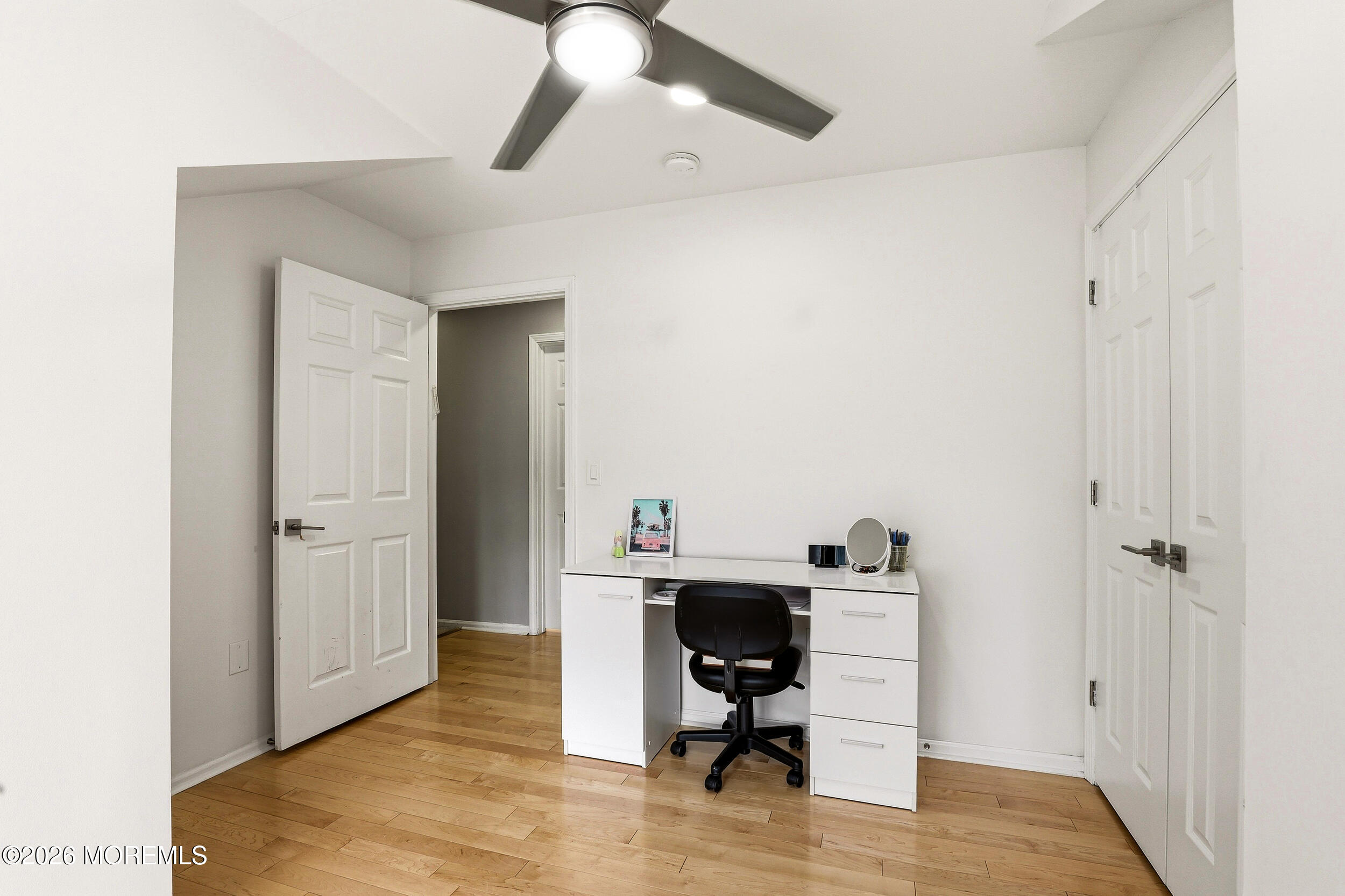 2055 MacKenzie Road Toms River, NJ 08755 - Photo 32 of 56 a view of a workspace with furniture and wooden floor