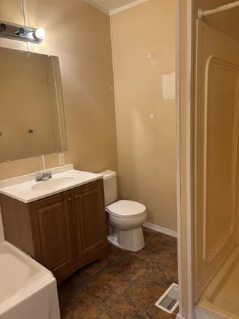 a bathroom with a sink and a toilet