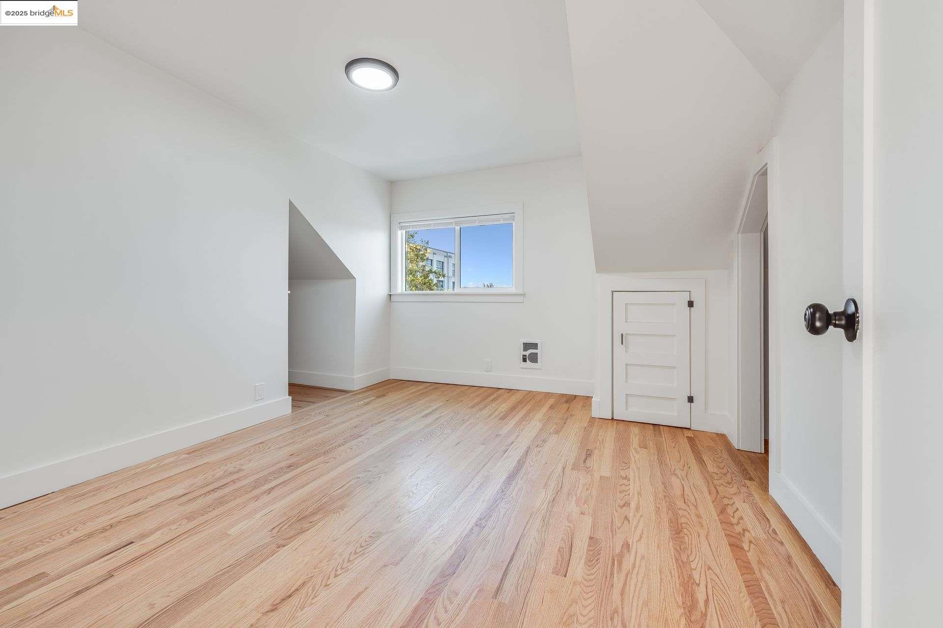1238 12th Street Oakland, CA 94607 - Photo 26 of 55 wooden floor in an empty room