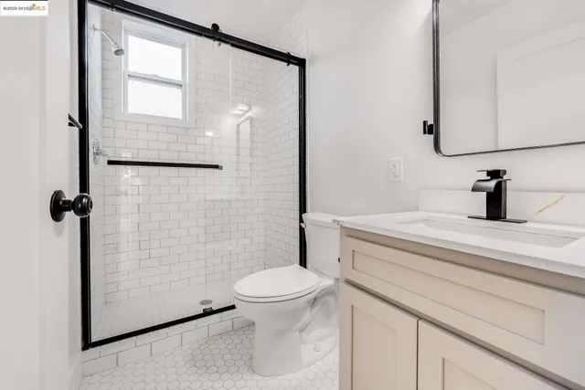 a view of hallway with wooden floor