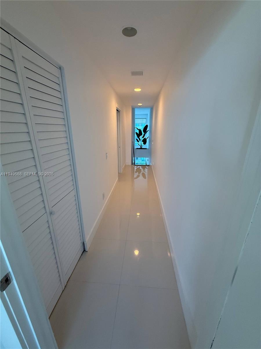 60 Southwest 13th Street, Unit 3808 Miami, FL 33130 - Photo 20 of 38 a view of a hallway
