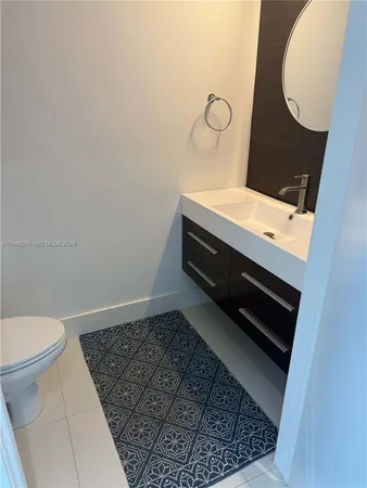 a bathroom with a sink and a vanity