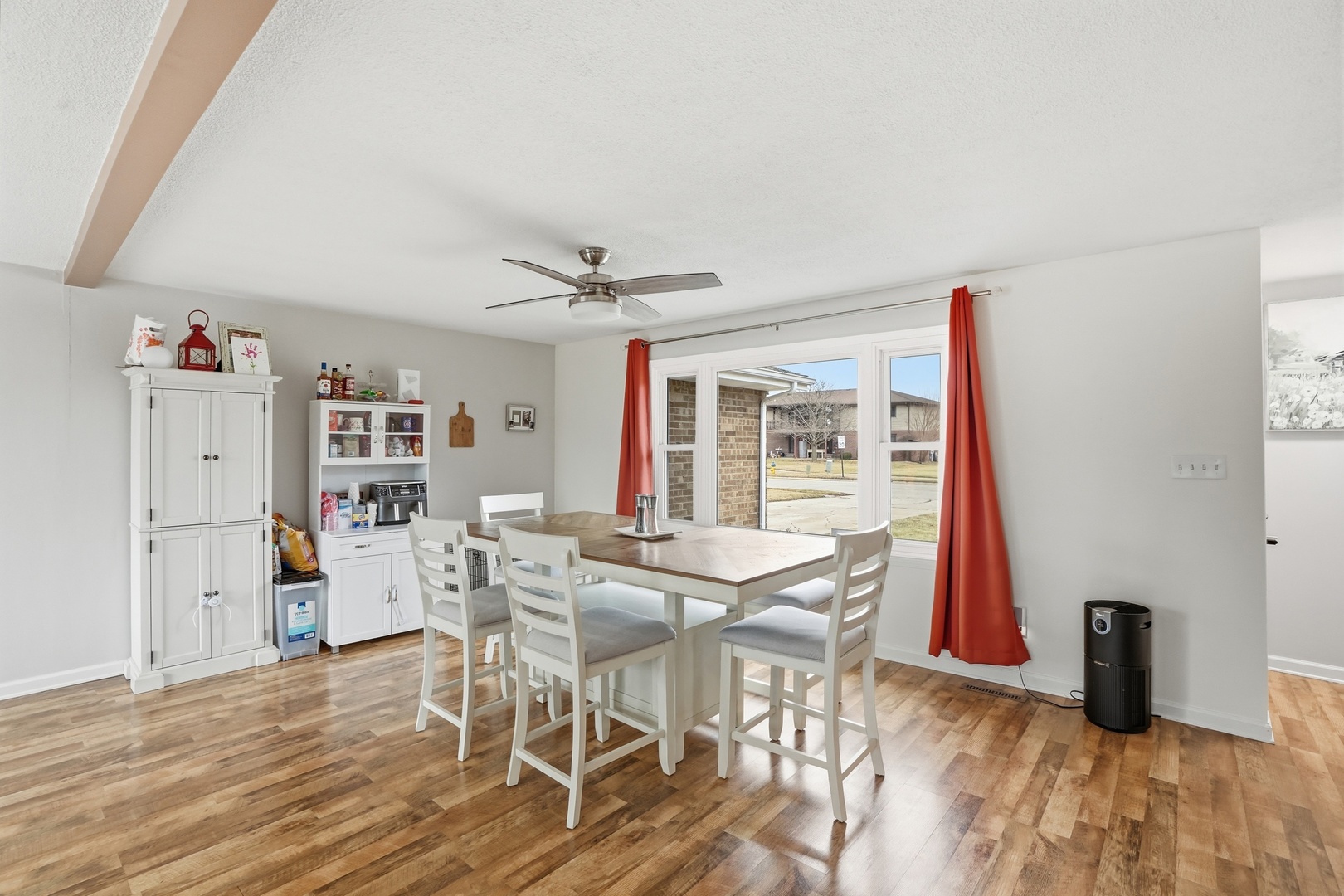 385 South Walnut Street Manteno, IL 60950 - Photo 7 of 27 a view of a dining room with furniture and wooden floor