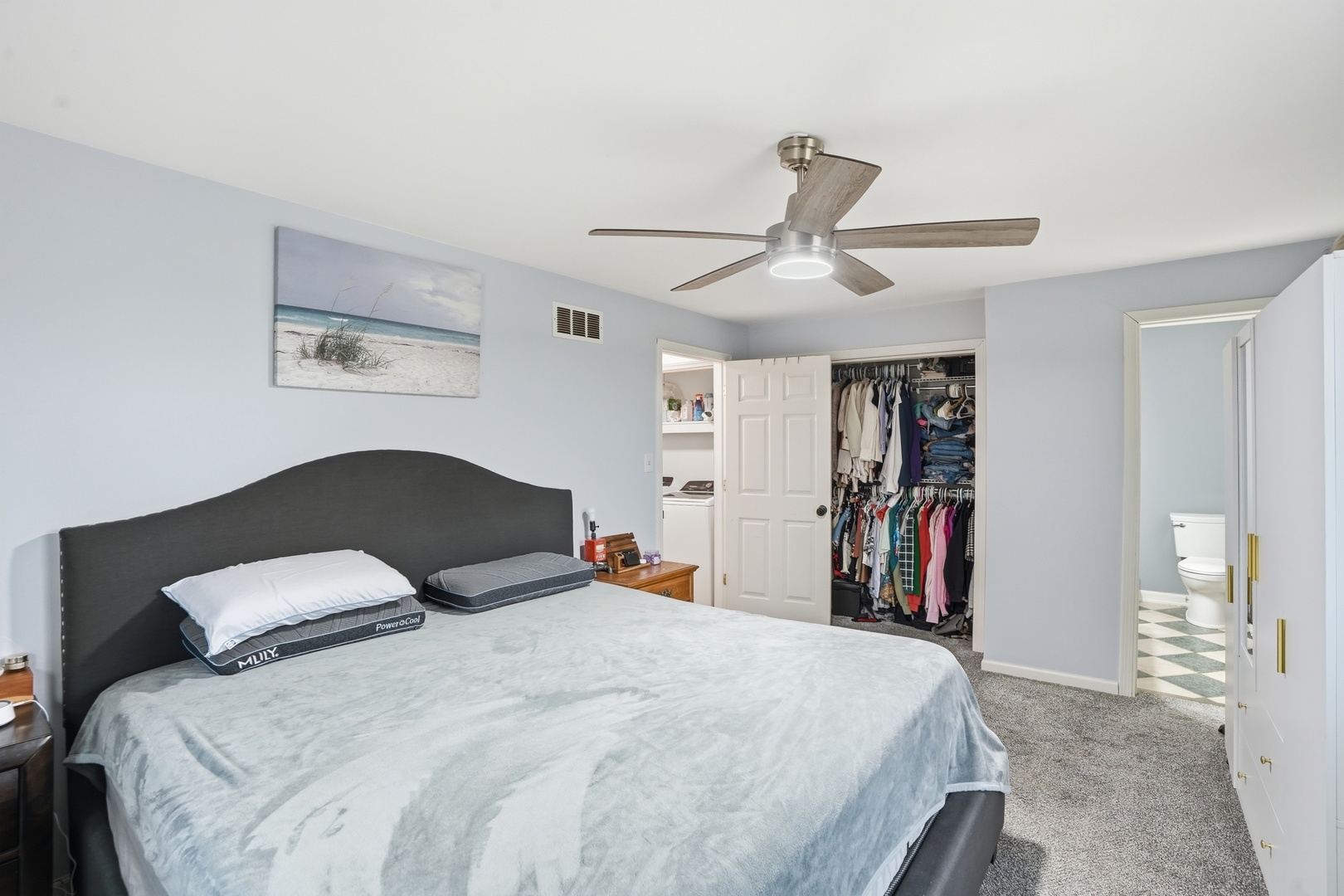 385 South Walnut Street Manteno, IL 60950 - Photo 10 of 27 a bedroom with a bed and a ceiling fan